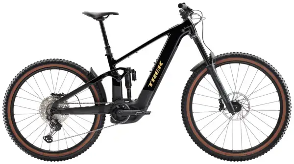 A black Trek electric mountain bike with thick tires, front and rear suspension, and a visible mid-drive motor.