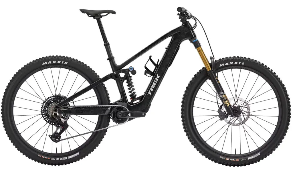 RideHub 17 A full-suspension black Trek electric mountain bike with thick tires, dropper seatpost, and visible battery and motor mounted in the frame.